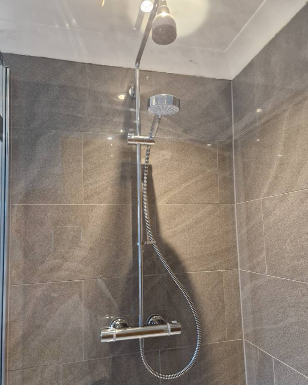 A modern shower installed by J.R.O Home Renovations