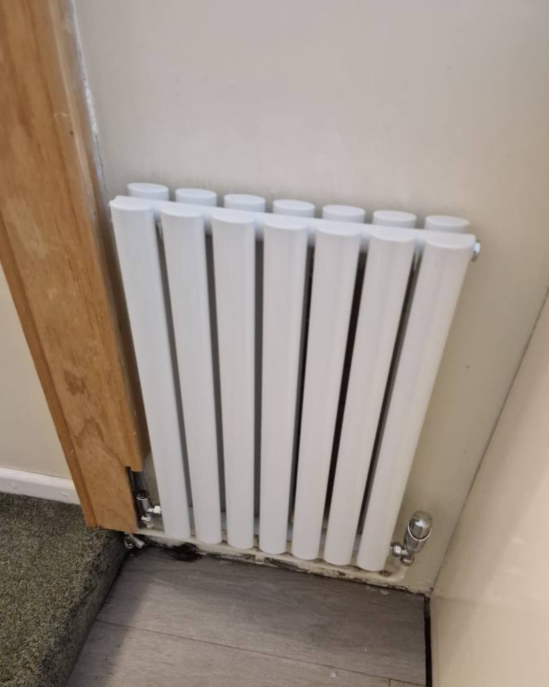 A modern radiator installed by J.R.O Home Renovations