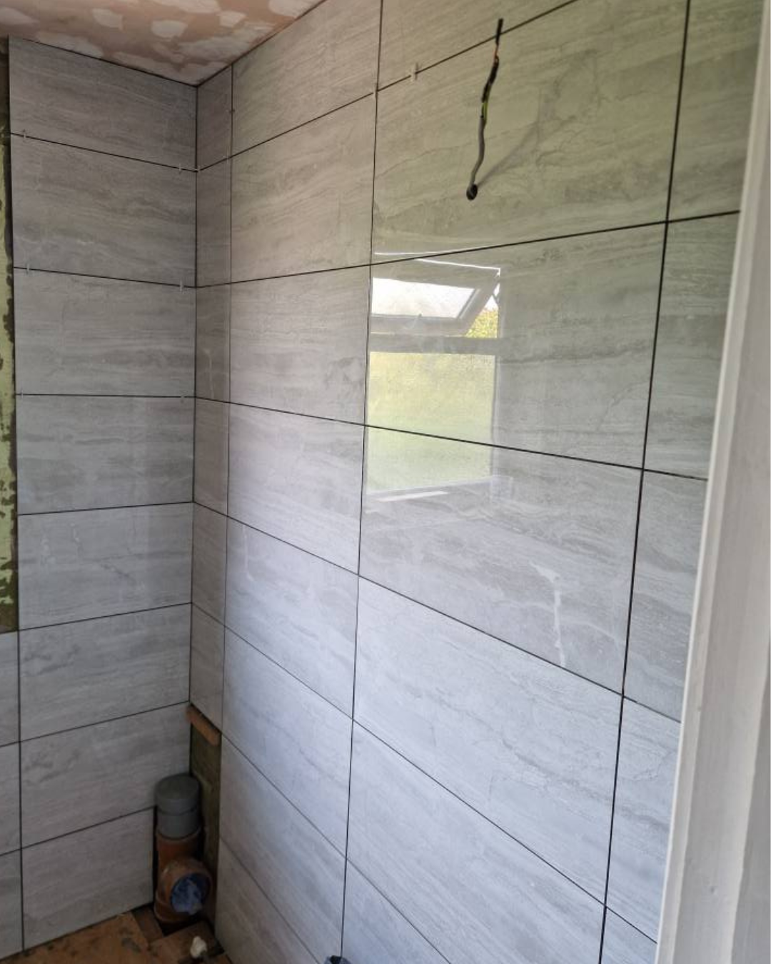 New tiling for a bathroom as part of an installation by J.R.O Home Renovations