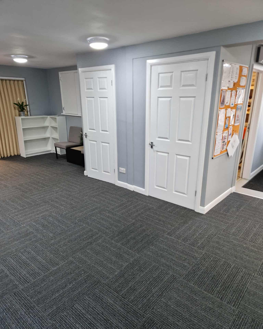 Painting and Decorating work with white doors and grey walls