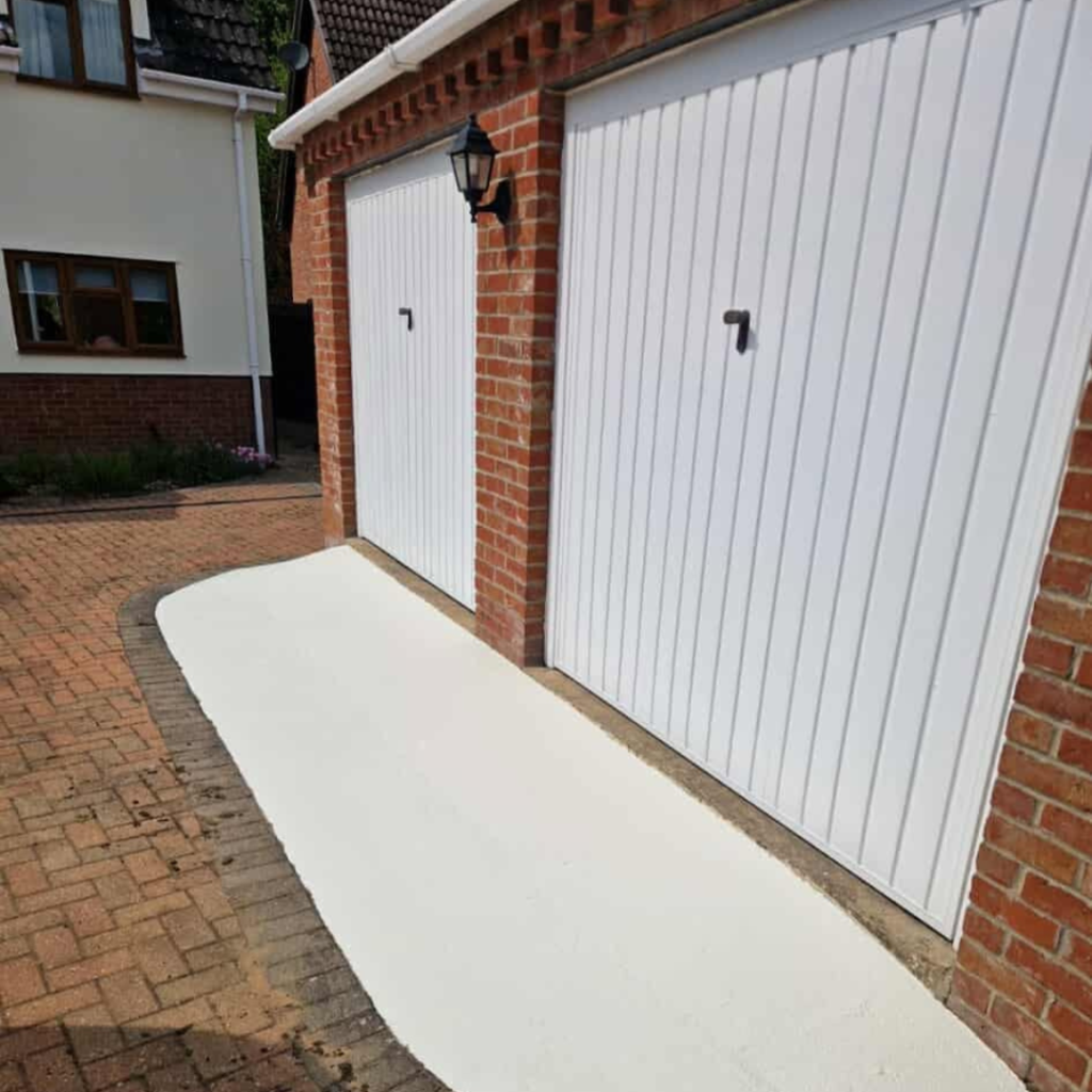 Professionally resprayed white garage doors